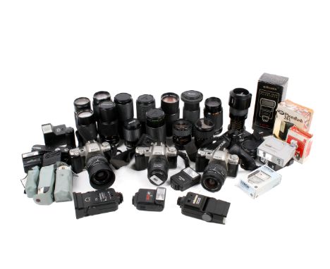 Collection of assorted vintage film cameras, lens and flashes. Including three Pentax MZ-50 SLR cameras and a group of Vivita
