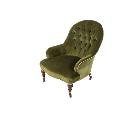 A late Victorian green upholstered button back chairs. Raised on turned tapering front supports with casters. H85cm
