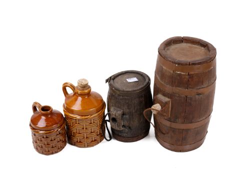 Four cider pots and barrels. Comprising two ceramic pots with brown glaze and marked 'Zummerzet', a wooden barrel with ring h