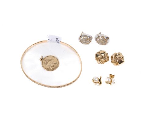A group of 9ct gold jewellery. Including Three pairs of various earrings, a bangle and a St Christopher pendant. Gross weight