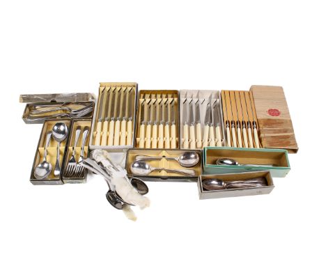 A collection of vintage flatware. Including a set of six knives with bakelite handles, spoons, etc. some in the original boxe