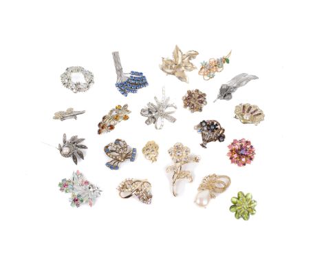 Twenty vintage brooches. Of various sizes and designs, some set with paste and glass details
