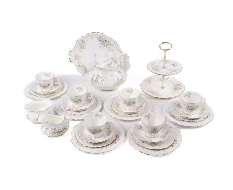 A Royal Albert 'Haworth' pattern tea service. Comprising a teapot, milk jug, sugar bowl, six cups and saucers, six small plat
