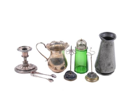 An assortment of collectables. Including a silver plated jug and candlestick, a pewter vase, a Victorian tea service glazed i
