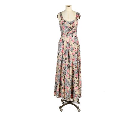 Two vintage dresses. Comprising a Robert Dorland full length dress. Having straps, a sweetheart neckline, boned bodice and ri