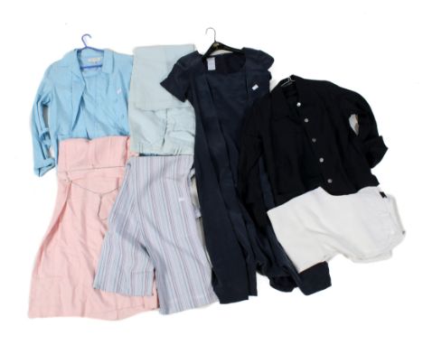 A large collection of Laura Ashley clothing. Including a blue suede dress, a navy suit, a blouse, etc.