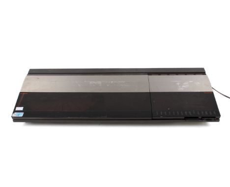 A vintage Bang & Olufsen Beocenter 2200 music centre with turntable. S/N 2931191, L75cm. (AF).