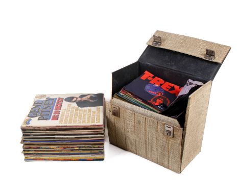 A collection of vintage vinyl. Including The Rolling Stones, T. Rex and more, the majority in the original sleeves, contained