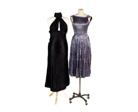 A collection of vintage evening gowns. Comprising a 1970s Kesman black slinky halter dress, L134cm (approx) x chest W36cm, an