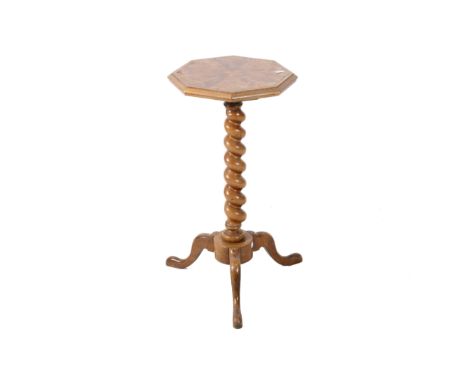 A 19th century oyster veneer inlaid occasional table. The octagonal top having parquetry details, attached to a twist stem an