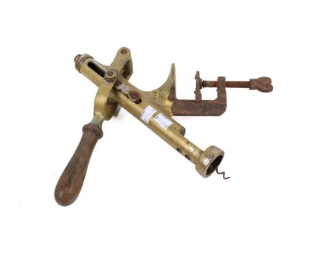 A vintage 'The Don' bar top brass corkscrew. With wooden handle. Approximate H40cm