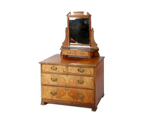 An Edwardian mahogany dressing table chest of drawers with mirror. Having a mirror top with raised shelf having drawers. The 