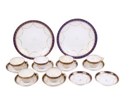 A Copeland six-piece tea service. Comprising six cups, eight saucers and two plates, all glazed in white with gilt details an