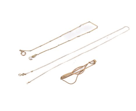 Three gold and yellow metal items. Comprising a tie clip marked '9ct', 4.7g, a 9ct gold curb chain, 1.4g, and a chain with re