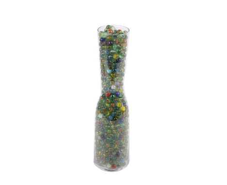 A large collection of glass marbles. Of similar size, contained within a large glass bottle, H45cm