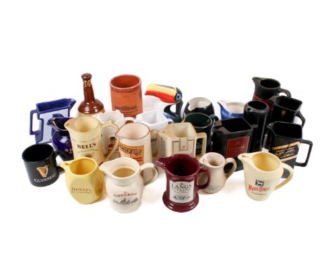 A large collection of brewery jugs. Including a Guinness Toucan, two Bells Whiskey, a Langs Supreme, etc. Max. H21cm