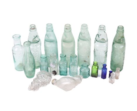 A collection of vintage glass bottles. Including three by Godfrey Archer, Fosters Clark & Co, 'Fruit Juice' and more, in a va