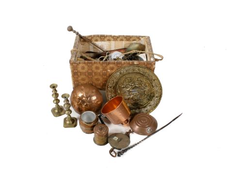 A large collection of assorted brass and copper items. Including a pair of candlesticks, horse brasses and a set of scales, e