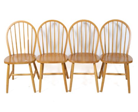 A set of four stick back 'Windsor' kitchen chairs. H93cm