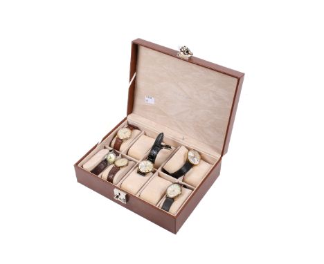 Six gentlemen's wristwatches. Including a boxed Timex with a quartz movement, a Seiko with a silvered dial and baton hour mar
