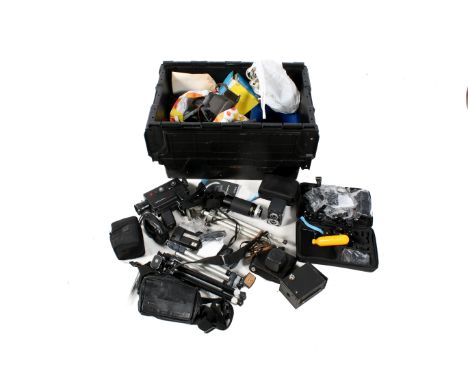 A large collection of assorted vintage film cameras and accessories. Including tripods, cine-camera and lens, etc. 