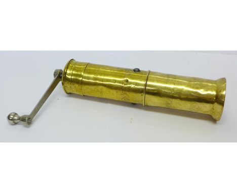 A vintage Trosser spice grinder
