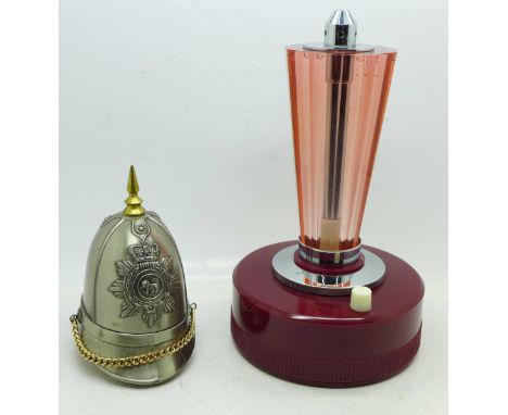 A Maruman electric table gas lighter and a helmet shaped table lighter