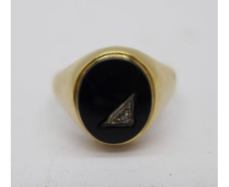 A 9ct gold, onyx and diamond ring, 3.8g, R