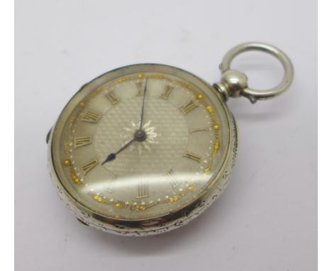 A silver fob watch with applied enamel plaque to the case back depicting a portrait of a dog's head