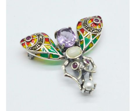 A silver plique a jour bug brooch set with amethyst, opal and pearl