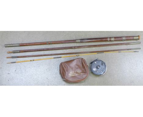 A Trudex fishing reel by Young &amp; Sons and a vintage fishing rod