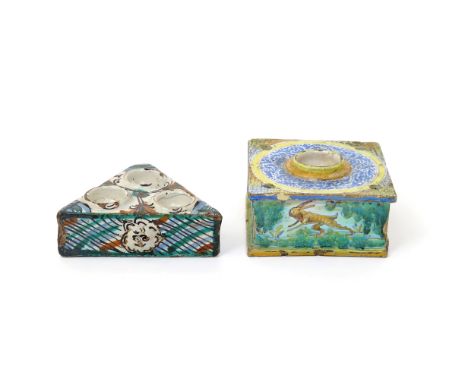 A Spanish faïence salt or spice dish  18th century, probably Talavera or Puente del Arzobispo, of triangular form and set wit