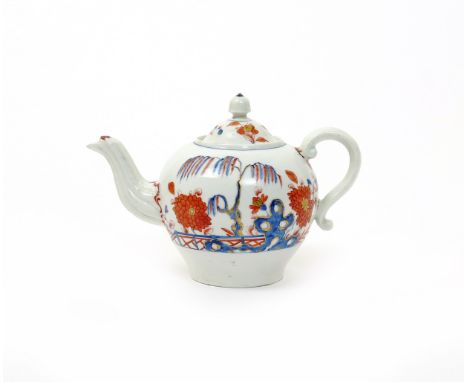 A rare Derby teapot and cover  c.1756, decorated in the Imari palette with flowering chrysanthemum and holey rockwork beneath