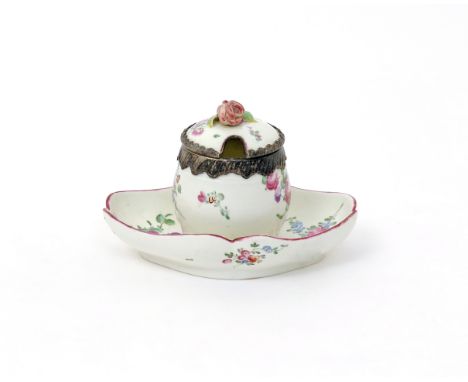 A Mennecy confiture  c.1760, the barrel-shaped preserve pot set into an oval base, with a metal-mounted hinged cover, painted