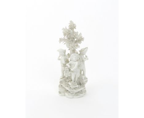 A Derby biscuit porcelain figure group of putti hunting  c.1780, the four figures arranged around a central tree, one with a 