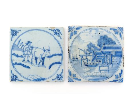 Two delftware tiles  18th century, one decorated with a figure in European costume driving a cow, the other with a figure sta