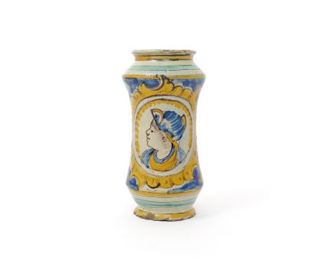 A Sicilian maiolica albarello  18th century, Caltagirone, the waisted form painted with the profile portrait of a solider wea