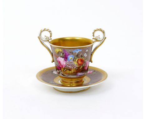 A Spode cabinet cup and saucer  c.1815, the two-handled cup finely painted with a basket of flowers on a marble ledge, the re