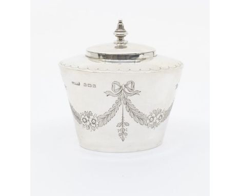 A George V silver tapering small tea caddy, the body engraved with ribbon tied swags of foliage, the hinged cover with urn sh