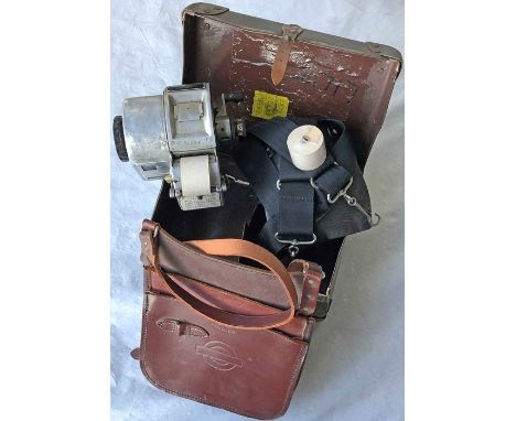 London Transport Gibson TICKET MACHINE with box, harness, leather CASH BAG and spare ticket roll. A letter-code machine, seri