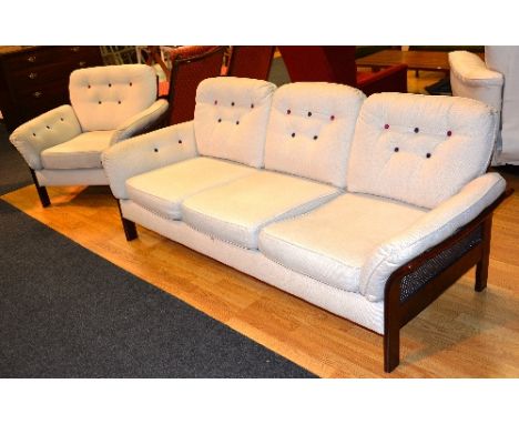 A Bergere three seater sofa with matching armchair, upholstered in white fabric, 72cm high, sofa 197cm wide