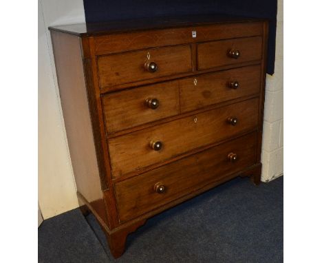 A George III mahogany inlaid chest of drawers, with two small drawers above three long drawers, with turned handles, ivory es