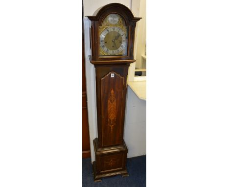 A mahogany inlaid granddaughter clock by Tempus Fugit, the hood with glazed door enclosing silvered dial with gilt metal mask