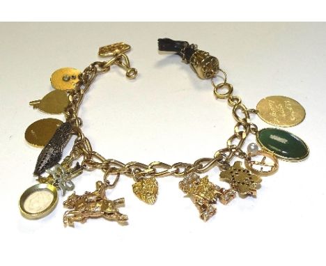 A 14ct gold charm bracelet, originally belonging to 1950's actress Terry Moore, wife of film director and pilot Howard Hughes