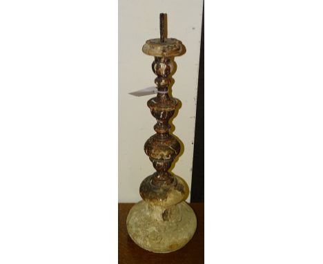 A 17th century Italian wooden painted pillar candlestick, of bulbous, turned form (a/f), 56cm high