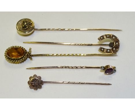 Five 9ct gold/yellow metal tie pins, two stamped 9ct; one set with amethyst and seed pearls, the other set with diamond chip,