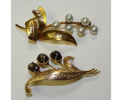 A 14ct gold pearl brooch, in the form of a plant, stamped 14k, 6cm long, together with a 14ct gold tigers eye brooch, also in