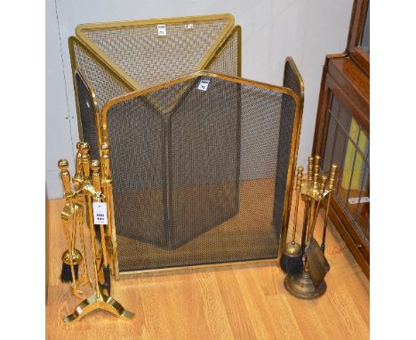 Two vintage fire guards, 71cm high, with two companion stands with fire irons (a lot)