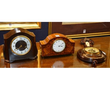 A walnut cased mantel clock, the white enamel dial with Arabic numerals, 14cm high, also with a Smiths of Enfield bakolite ca