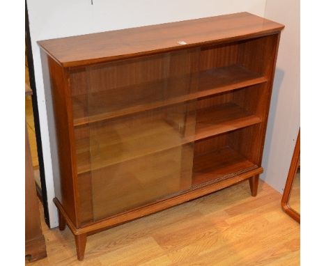 A vintage walnut display cabinet, with two glazed sliding doors, enclosing shelved interior, 88cm high x 100cm wide x 27cm de